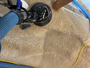 A-1 Carpet Cleaning technician using hot water extraction Ames Iowa