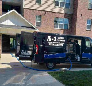 A-1 Carpet Cleaning van providing emergency carpet water extraction in Ames, Iowa