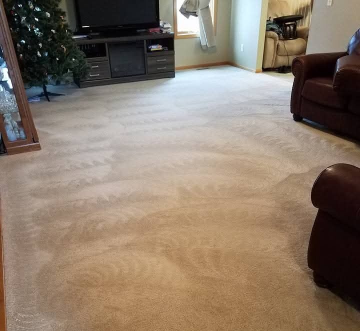 Monthly home carpet care checklist for busy families in Ames Iowa living room with clean carpet