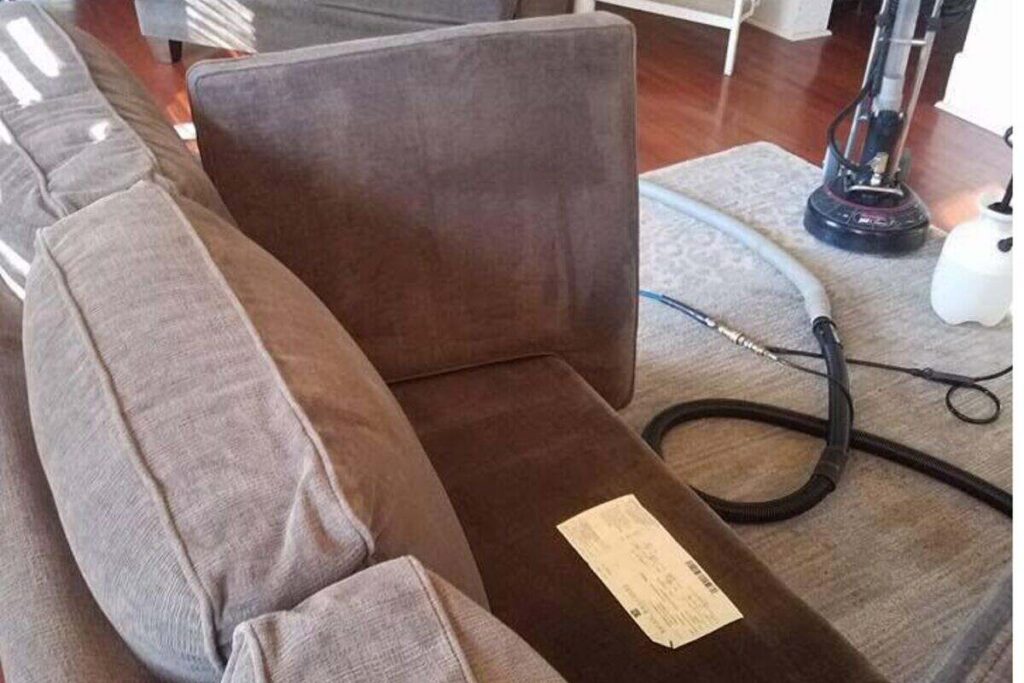 Professional sofa cleaning in progress in Ames, Iowa