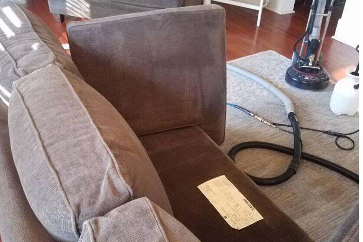 Professional sofa cleaning in progress in Ames, Iowa